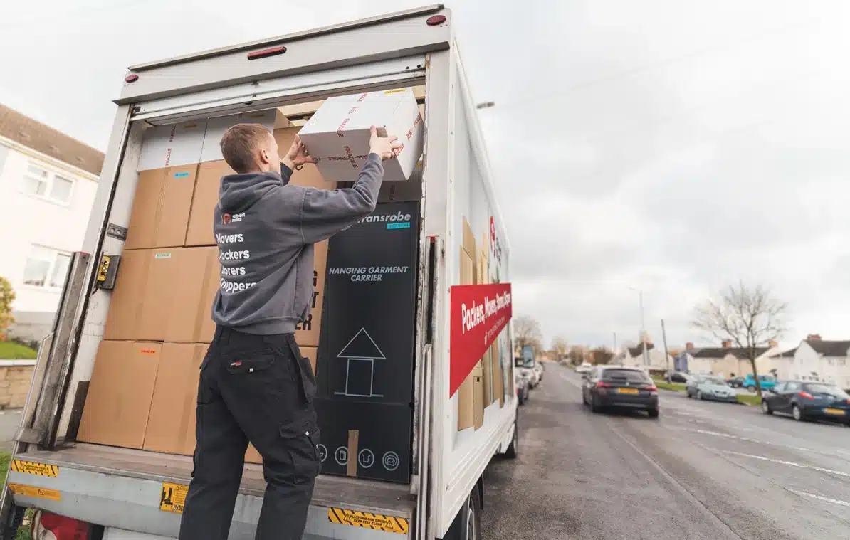 Albert Miles team assembling furniture after a move